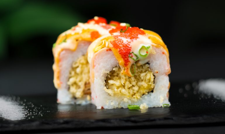 Spider Roll sushi with soft shell crab, salmon, cheese, ebiko, and mayo served at Sushi Yaki Uttara