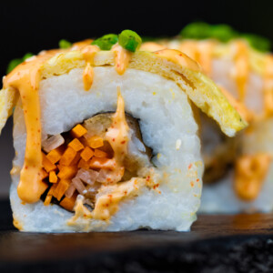 Tamago Roll sushi with soft egg wrap, fresh vegetables, and tender dory fish at Sushi Yaki Uttara