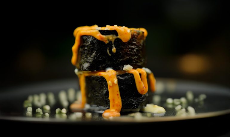 Udon Roll with noodles, tamago, vegetables, and creamy-spicy sauce at Sushi Yaki Uttara